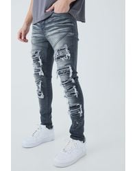 BoohooMAN - Super Skinny Pu Biker Rip & Repair Paint Splatter Jeans - Lyst