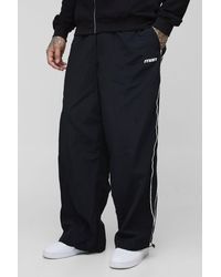 BoohooMAN - Tall Stripe Embroidered Parachute Trousers - Lyst
