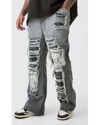 Boohoo - Plus Relaxed Rigid Flare Rip & Repair Applique Jeans - Lyst