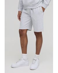 BoohooMAN - Lightweight Basic Slim Fit Mid Length Shorts - Lyst