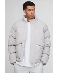 BoohooMAN - Oversized Fit Textured Funnel Neck Puffer Jacket - Lyst