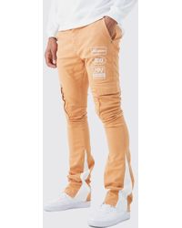 BoohooMAN - Tall Fixed Waist Skinny Stacked Flare Moto Cargo Trouser - Lyst