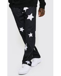 BoohooMAN Relaxed Fit Star Print Jogger - Black