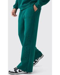 BoohooMAN - Embossed Worldwide Wide Leg Sweatpants - Lyst