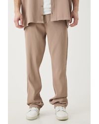 BoohooMAN - Tall Elasticated Waist Slim Flare Stacked Pleated Trouser - Lyst