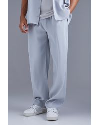 BoohooMAN - Elasticated Waist Relaxed Fit Pleated Trouser - Lyst
