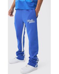 BoohooMAN - Slim Stacked Flare Star Print Gusset Sweatpants - Lyst