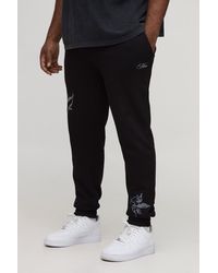 BoohooMAN - Plus Regular Fit Cherub Worldwide Print Jogger - Lyst