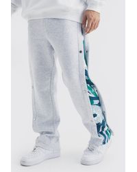 BoohooMAN - Relaxed Printed Side Panel Popper Jogger - Lyst