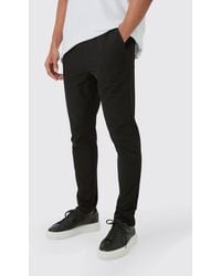 BoohooMAN - Elasticated Waist Technical Stretch Slim Pants - Lyst