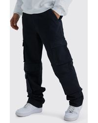 BoohooMAN - Tall lockere Cargo-Jeans mit Taschen - Lyst