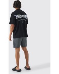 BoohooMAN - Oversized Extended Neck Worldwide Back Print T-shirt & Swim Set - Lyst