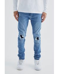 BoohooMAN - Skinny Stacked Distressed Ripped Let Down Hem Jean - Lyst