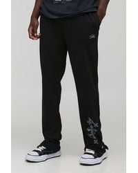 BoohooMAN - Tall Regular Fit Split Hem Cross Print Jogger - Lyst