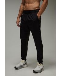 BoohooMAN - Common Pace Running Ultra Stretch Tapered Jogger - Lyst