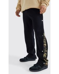 BoohooMAN - Relaxed Camo Gusset Popper Jogger - Lyst