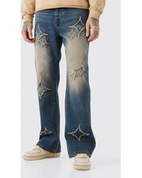 BoohooMAN - Tall Relaxed Rigid Flare Self Fabric Applique Gusset Jeans - Lyst