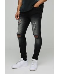 BoohooMAN - Super Skinny Washed Black Ripped Jeans - Lyst