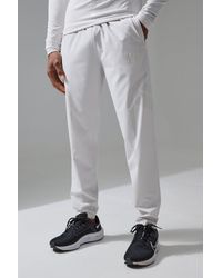 BoohooMAN - Active Training Dept Slim Woven Perforated Jogger - Lyst