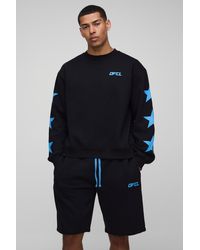 Boohoo - Chándal Oversize Recto De Pantalón Corto Con Capucha Y Estampado Ofcl De Estrellas - Lyst