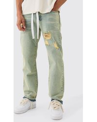 BoohooMAN - Relaxed Rigid Ripped Let Down Hem Jeans With Extended Drawcords In Green Wash - Lyst
