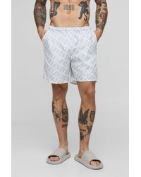 BoohooMAN - Abstract Pattern Printed Mid Length Swim Trunks - Lyst