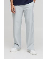 BoohooMAN - Elasticated Waist Relaxed Fit Technical Stretch Pants - Lyst