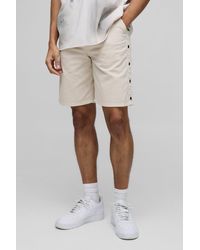 BoohooMAN - Relaxed Fit Overdyed Twill Popper Hem Shorts - Lyst