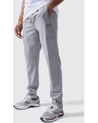 BoohooMAN - Active Training Dept Tapered Cargo Joggers - Lyst