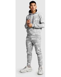 all over man printed hooded tracksuit red