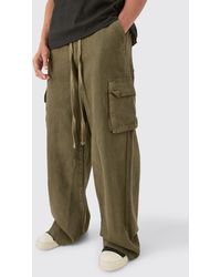 BoohooMAN - Extreme Baggy Fit Toggle Cargo Trousers In Khaki - Lyst