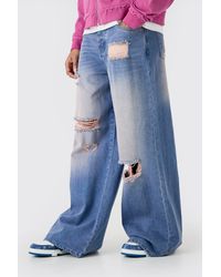 BoohooMAN - Extreme Baggy Overdyed Frayed Self Fabric Applique Jeans - Lyst
