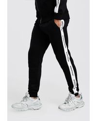 BoohooMAN Skinny Fit Jogger With Man Official Tape - Black