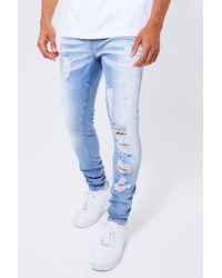 BoohooMAN - Skinny Stretch All Over Rip & Repair Jeans - Lyst