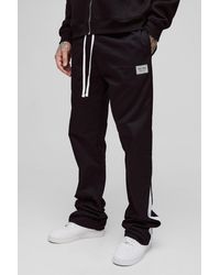 BoohooMAN - Tall Extended Drawcord Stacked Flared Pants - Lyst