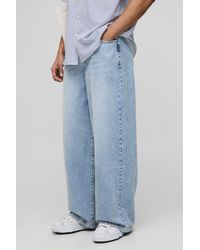 BoohooMAN - Lockere blaue Parachute Jeans - Lyst
