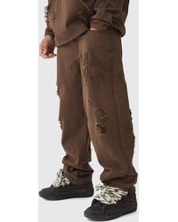 BoohooMAN - Baggy Fit Cross Applique Dirty Wash Jeans - Lyst