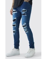 BoohooMAN - Tall Super Skinny Stretch Biker Rip & Repair Jeans In Vintage Blue - Lyst