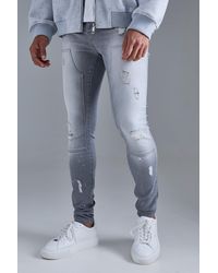 BoohooMAN - Skinny Stretch Stacked Ripped Carpenter Zip Hem Jeans In Grey - Lyst