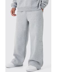 BoohooMAN - Embossed Worldwide Wide Leg Sweatpants - Lyst