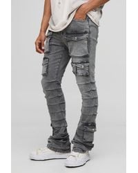 BoohooMAN - Skinny Stacked Multi Cargo Pocket Flared Jeans - Lyst