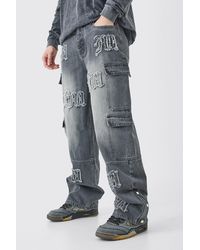 BoohooMAN - Tall Baggy Rigid Bm Applique Multi Pocket Cargo Jeans - Lyst