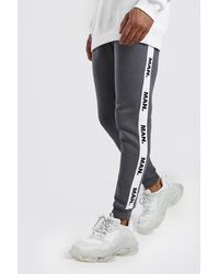BoohooMAN Skinny Fit Joggers With Man Repeat Tape - Gray