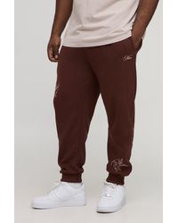 BoohooMAN - Plus Regular Fit Cherub Worldwide Print Jogger - Lyst