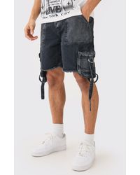 Boohoo - Pantalón Corto Vaquero Holgado Sin Tratar Con Bolsillos Cargo En Negro Desteñido - Lyst