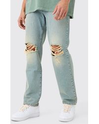BoohooMAN - Relaxed Rigid Ripped Knee Jeans In Antique Blue - Lyst