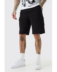 BoohooMAN - Tall Elastic Waist Relaxed Fit Cargo Shorts In Black - Lyst