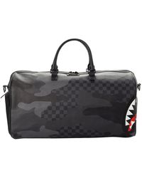 sprayground shark shaped duffle bag