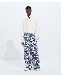 Bottega Veneta - Cotton Fil Coupé Printed Trousers - Lyst