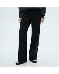 Mango - Knitted Trousers With Contrasting Stripes - Lyst